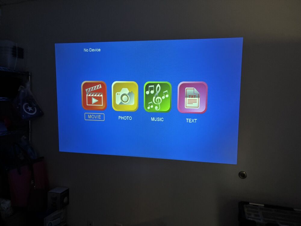 Brookstone All-In-One Home Theater Projector and Screen Set