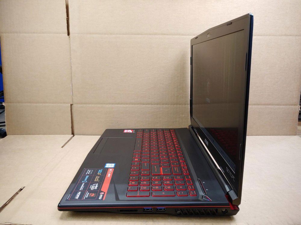 MSI GL63 8RC Gaming Laptop - 15.6 Inch, Intel i5-8300H, 16GB RAM, 256GB SSD + 1TB HDD, GTX 1050, Windows 11