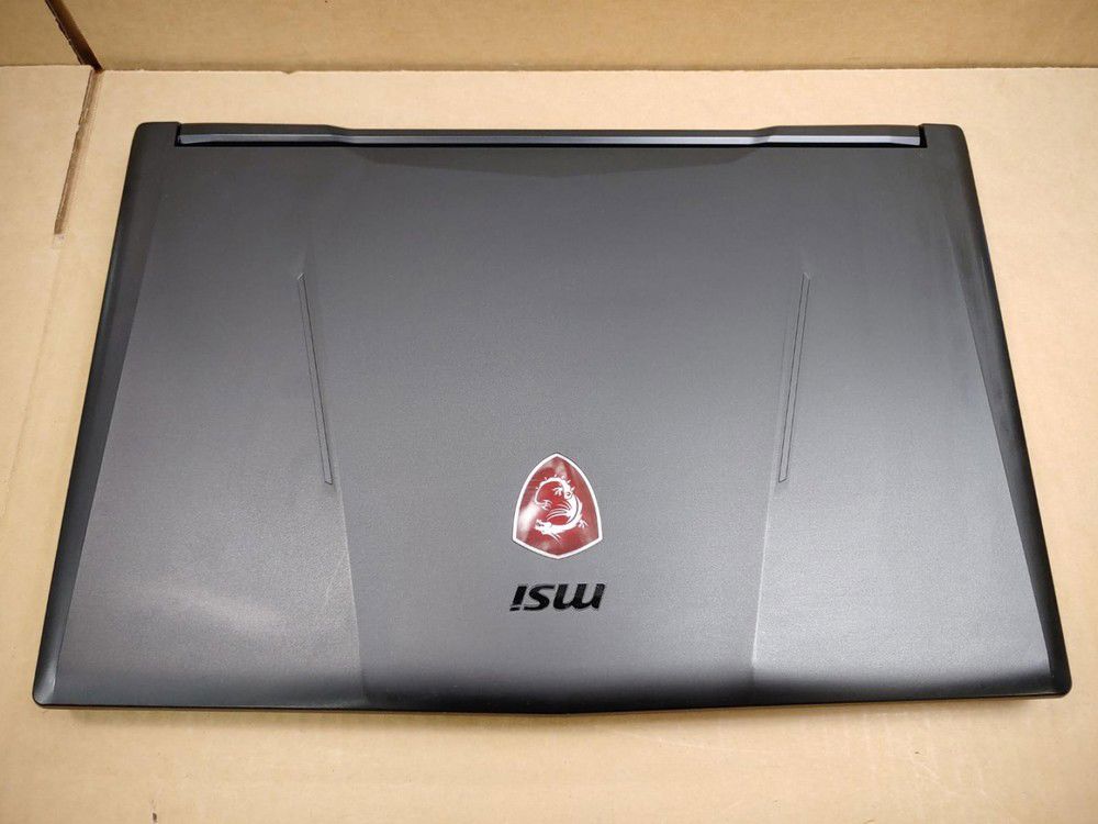 MSI GL63 8RC Gaming Laptop - 15.6 Inch, Intel i5-8300H, 16GB RAM, 256GB SSD + 1TB HDD, GTX 1050, Windows 11