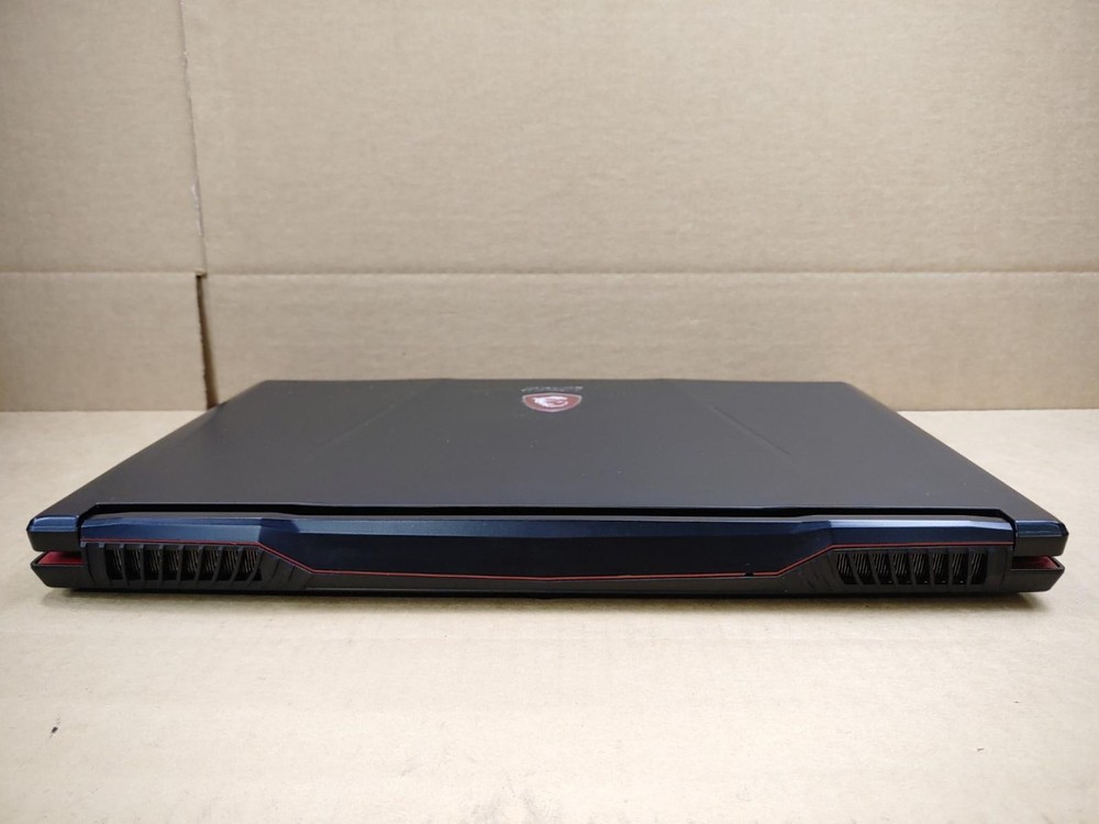 MSI GL63 8RC Gaming Laptop - 15.6 Inch, Intel i5-8300H, 16GB RAM, 256GB SSD + 1TB HDD, GTX 1050, Windows 11